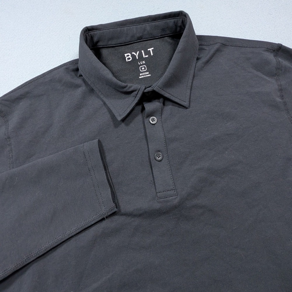 BYLT Lux Long Sleeve Polo Mens Medium Black Drop Cut Hem Stretch Casual